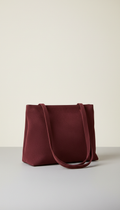 Pochette en faux-daim bordeaux profond